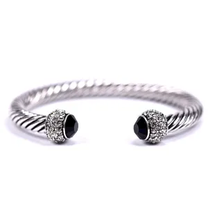 Antique effect twisted open bangle with crystal feature ends